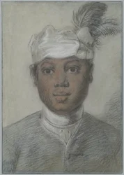 Hode av en ung svart mann med fjærprydet turban