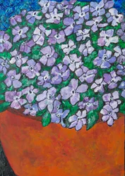 Levende lilla potteblomster
