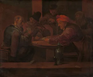 Menn som spiller kort i en taverna