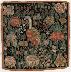 Putetrekk av billedvev som viser en fugl blant blomster, laget i Schleswig-Holstein, Danmark, ca. 1690 (ull)