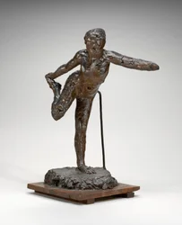 Danser holder høyre fot i høyre hånd, muligens 19001911.