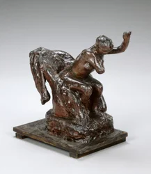 Kvinne sitter i en lenestol og tørker av venstre armhule, ca. 1890-tallet (brun voks og plastiline)