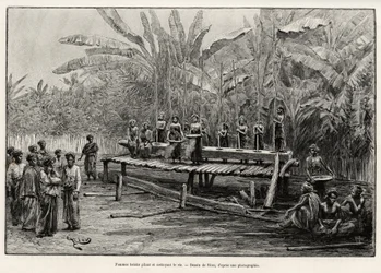 Batak-kvinner, etnisk gruppe i Nord-Sumatra, banker og renser ris. Gravering av Riou for å illustrere historien "et år i Malaysia", av Jules Claine (1856-1939)