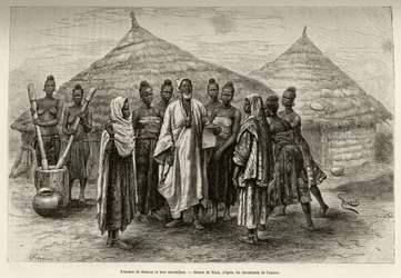 Kvinnene til Samory Touré (ca. 1835-1898), krigshøvding ved Nigerbuen, og deres oppsynsmann, en Soninke, som kan lese og skrive arabisk, slik papiret han holder i hånden viser. Gravering av Riou for å illustrere fortellingen 