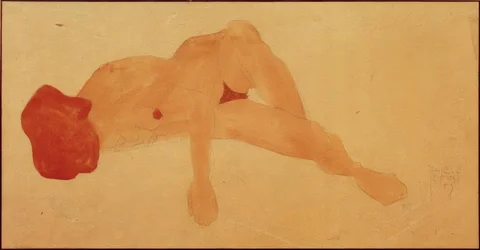 Liggende naken kvinne