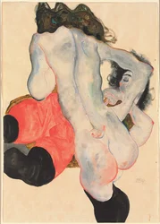 Kvinne med røde bukser og stående kvinnelig nakenmodell, 1912