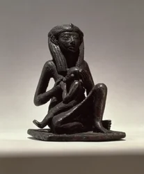 Prinsesse som ammer et barn, muligens fra Edfu, andre mellomperiode (kobber)