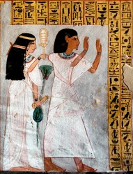 Egyptisk antikvitet: karakterer i tilbedelse. Tomb of Roy (TT255). 18. dynasti. Fra Vestbredden av Luxor, Egypt - Det gamle Egypt: Osiris blir tilbedt av et par. Tomb of Roy (TT 255). 18. dynasti. Fra vestbredden av Luxor, Egypt