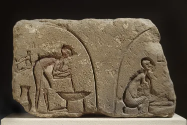 Sandsteinrelieff ved tilberedning av et måltid (sandstein)