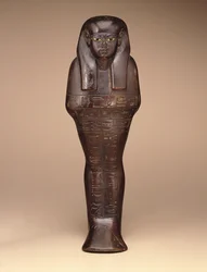 Shawabti av Maya, New Kingdom, ca. 1390–1353 f.Kr. (tre, maling og glass)