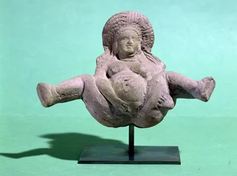 Statuett av en fødende kvinne, gitt til gravide kvinner for en vellykket fødsel, fra Alexandria (terrakotta)
