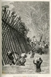 Passasjen av elven Lovoi (eller djevelens elv) (Katanga-regionen, Kongo) av ekspedisjonen, tegning av Emile Bayard, for å illustrere reisen gjennom Afrika, fra Zanzibar (Tanzania) til Benguela (Angola), fra 1873 til 1876 , av den britiske sjefen V.L.