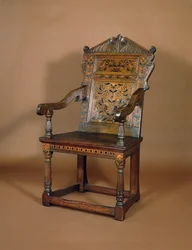 En Charles I lenestol, midten av 1600-tallet (eik med marquetry-innlegg)