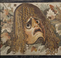 Festong med masker, blader og frukt