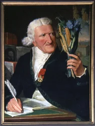 Parmentier holder men og potetblomsten