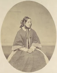 [Ung kvinne i prikket kjole], 1850-60-tallet.