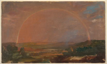 Rainbow over et kupert landskap