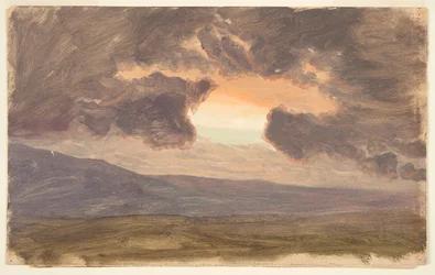 Solnedgang over nakne åser