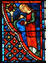 Detalj fra et vindu som viser scener fra livet til St. Mary den egyptiske