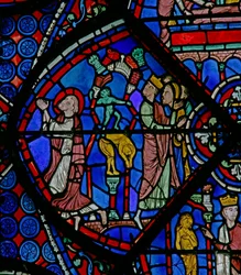 St Thomas-vinduet: mens han ber bryter demonen hedenske statuer (w23)