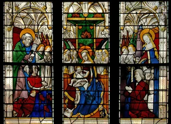 Vindu E3 som viser jomfruen og barnet på tronen: også giverne med deres skytshelgener (St. Peter og St. Barbara)