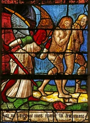 Vindu som viser Adam og Eva som blir utvist fra Eden (farget glass)