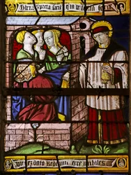 Vindu som viser Saint Nicholas som legger igjen penger til faren til tre jenter for å unngå at de går inn i prostitusjon (glassmaleri)