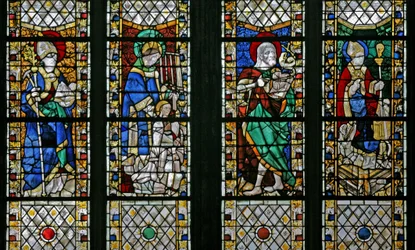 Vindu w47 som viser St Eloi, St Laurence, St John the Baptist og St Nicholas