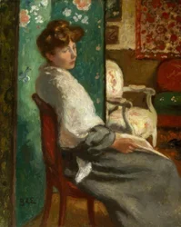 Kvinne sitter