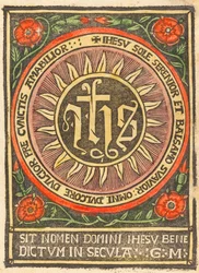 Monogram JHS i en flammende sirkel