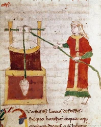 En kvinne som henter vann fra miniatyrbrønnen hentet fra bindet "De puteis"" av manuskriptet "De Universo"" (eller De rerum naturis (De la Nature des choses)) (cod. 132) av Rabanus Maurus Magnentius (eller Raban) Maur eller Rabano Mauro) (ca. 780-856). 9. 