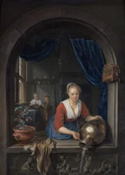 Tjenestepike ved vinduet