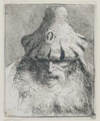 Gammel mann med kjegleformet hatt