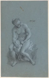 Sittende kvinne