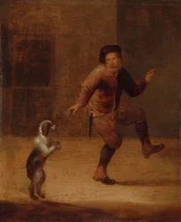 En mann som danser med en hund