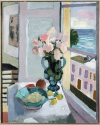 Blomster foran et vindu