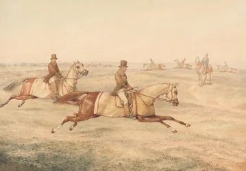To ryttere som trener hester i galopp