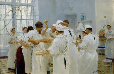 Kirurgen Ivan Pavlov (1849-1936) i en operasjonssal. Omgitt av sitt medisinske team, assistenter og sykepleiere opererer kirurgen en syk pasient. Maleri av Ilja Jefimovitsj Repin (Ilia Repine)