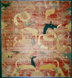 Del av et teppe med fantastiske dyr på rød bakke, Mughal, ca. 158085 (bomulls- og ullhaug)