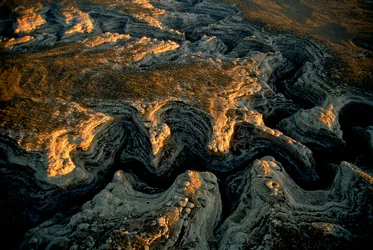 Et luftfoto av en uttørket mesa i Utah - Grand Gulch forsynte vann til en rekke små ...