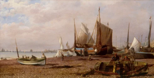 Brighton-stranden med fiskebåter
