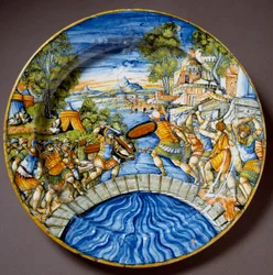 Episode fra forsvaret av Pons Sublicius ved den legendariske romerske helten Horatius Cocles under kampene mot etruskerne. Keramisk fat produsert i Urbino i Fontana-verkstedet, Italia. Omkring 1560. Firenze, Museo Nazionale del Bargello