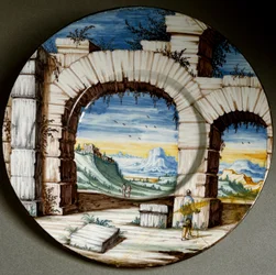 Ruin og landskap. Keramikktallerken laget i Angarano, Italia. Omkring 1650. Museo Nazionale del Bargello, Firenze