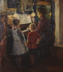Kvinne og barn ved pianoet