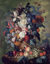 En vase med blomster og frukt