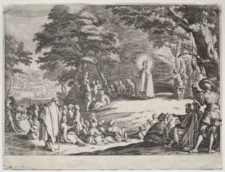 St. Amand forkynner i en skog.