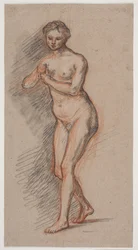 Kvinnelig modellfigur med hendene foran brystet