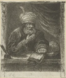 Mann med turban bak et skrivebord