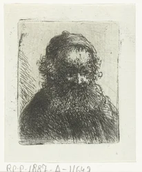 Gammel mann med skjegg og hatt