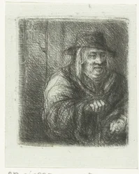 Gammel mann med kappe og hatt